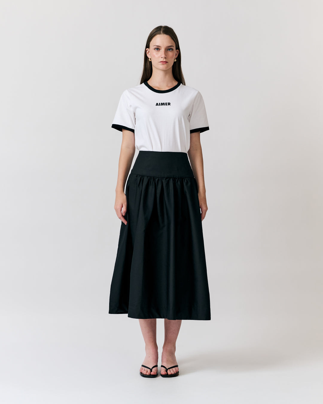 AIMER - Midi A Skirt With Pockets in Black