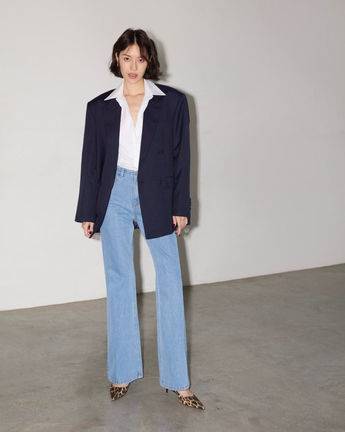 AIMER - 70s Flared Jeans in Light Blue Wash